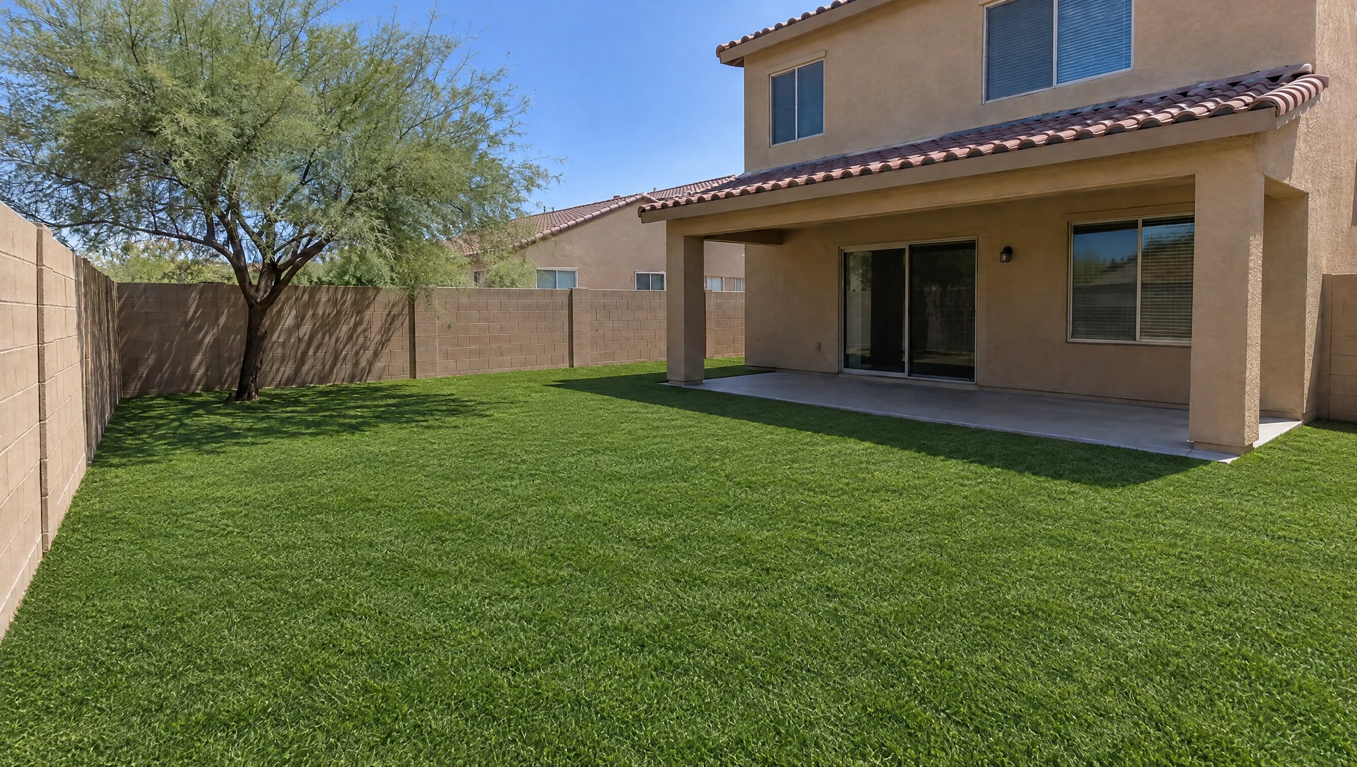 After: Gilbert backyard, dead grass replaced with artificial turf